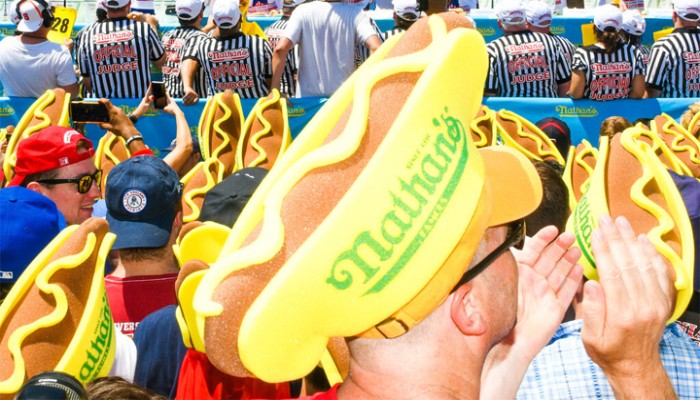 How Competitive Eaters Down Dozens of Hot Dogs